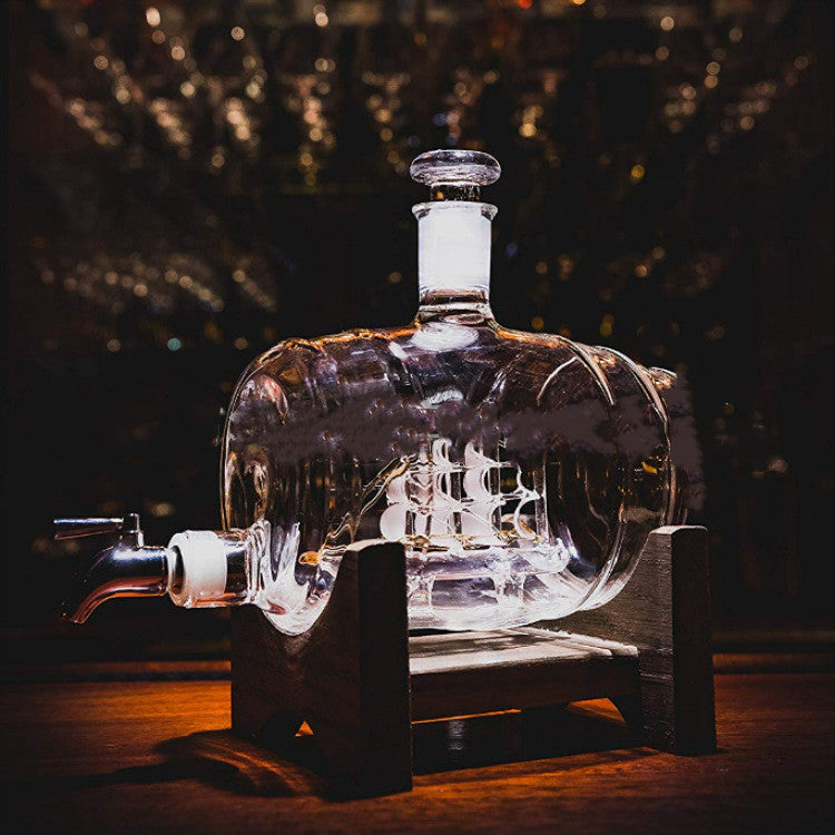 Botte di vino artigianale a vela  in vetro liscio da 1000 ml , con rubinetto.